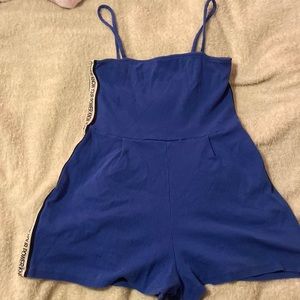 bershka M size romper, blue, "know your power" label down both sides